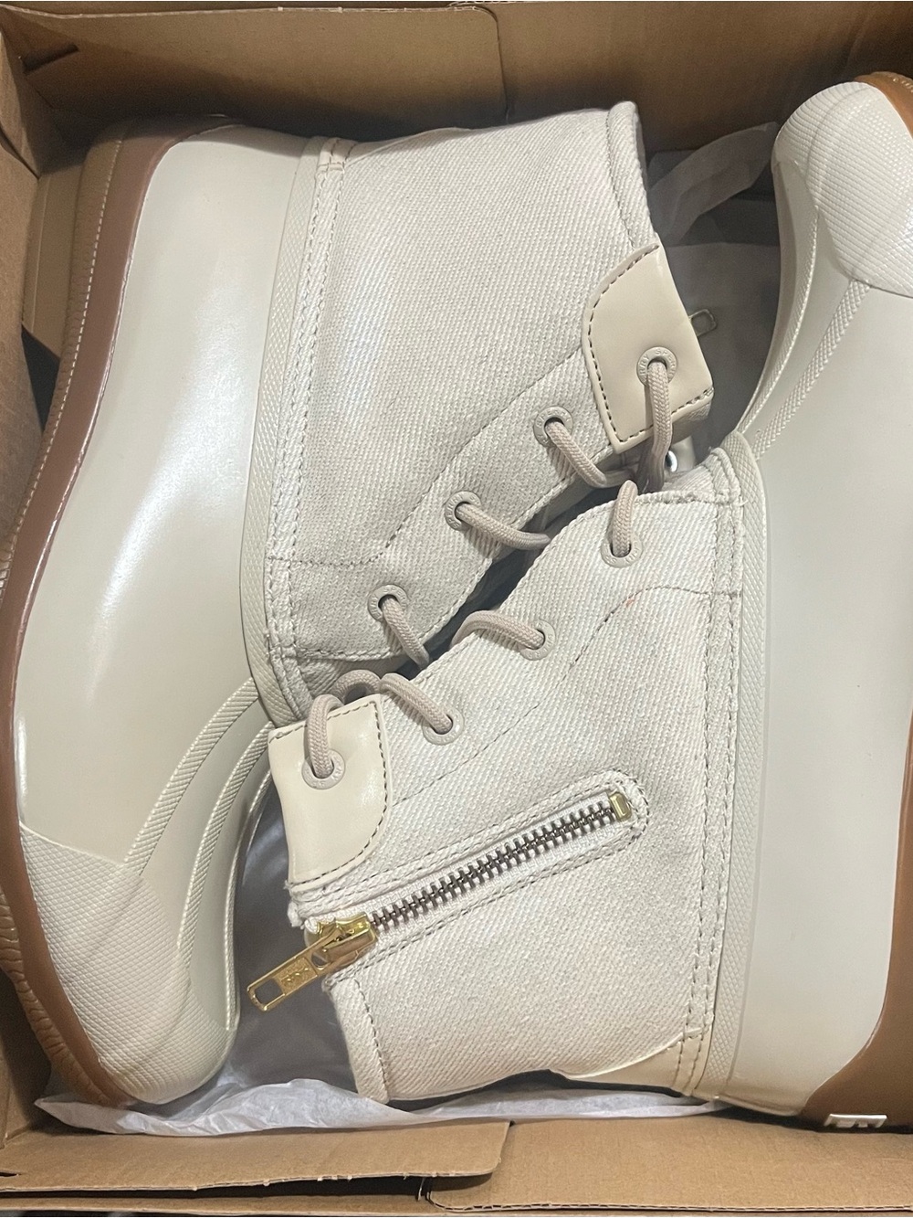 Beige Sperry winter boots